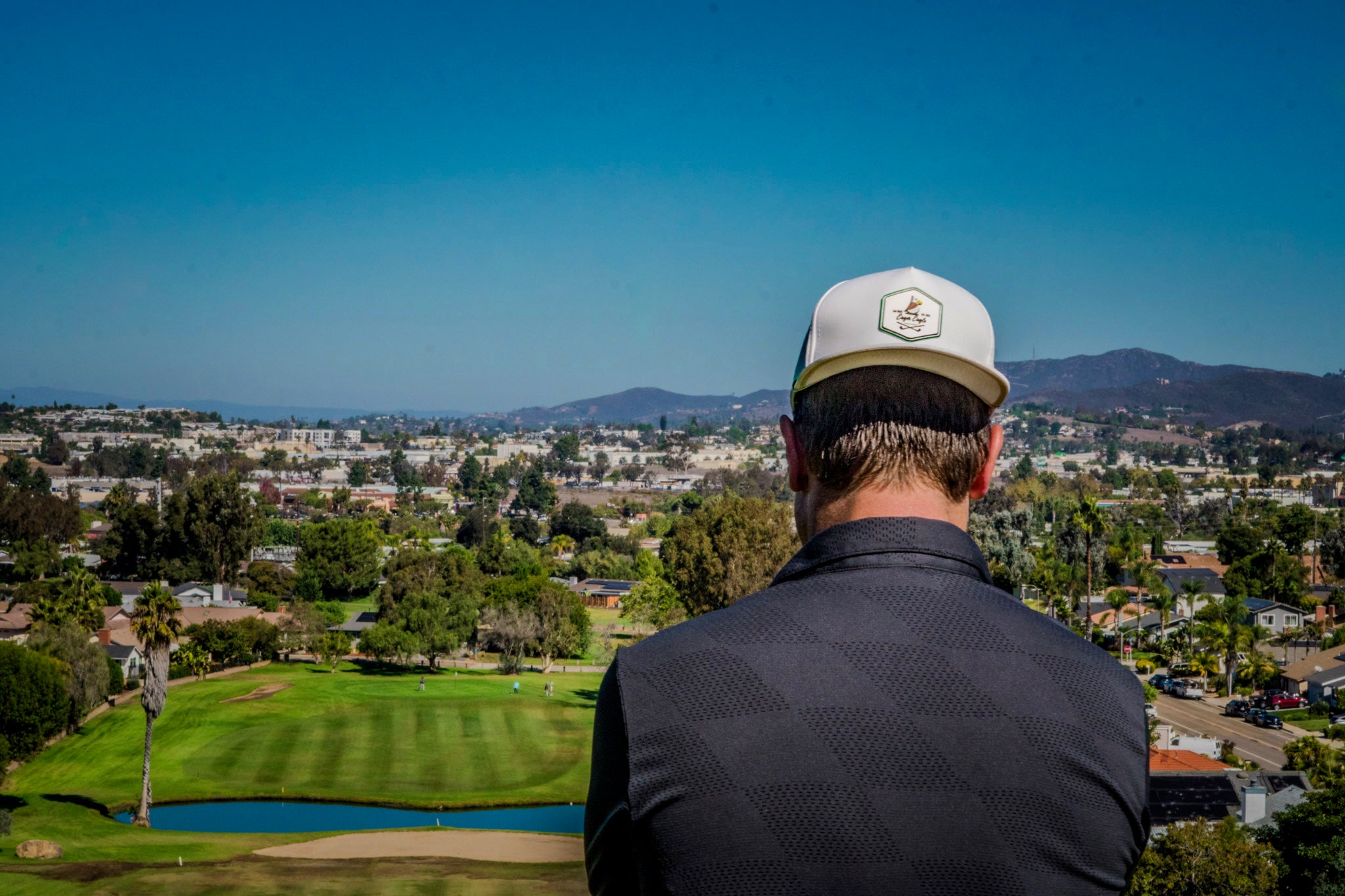 Golfer wearing roped eagle hat