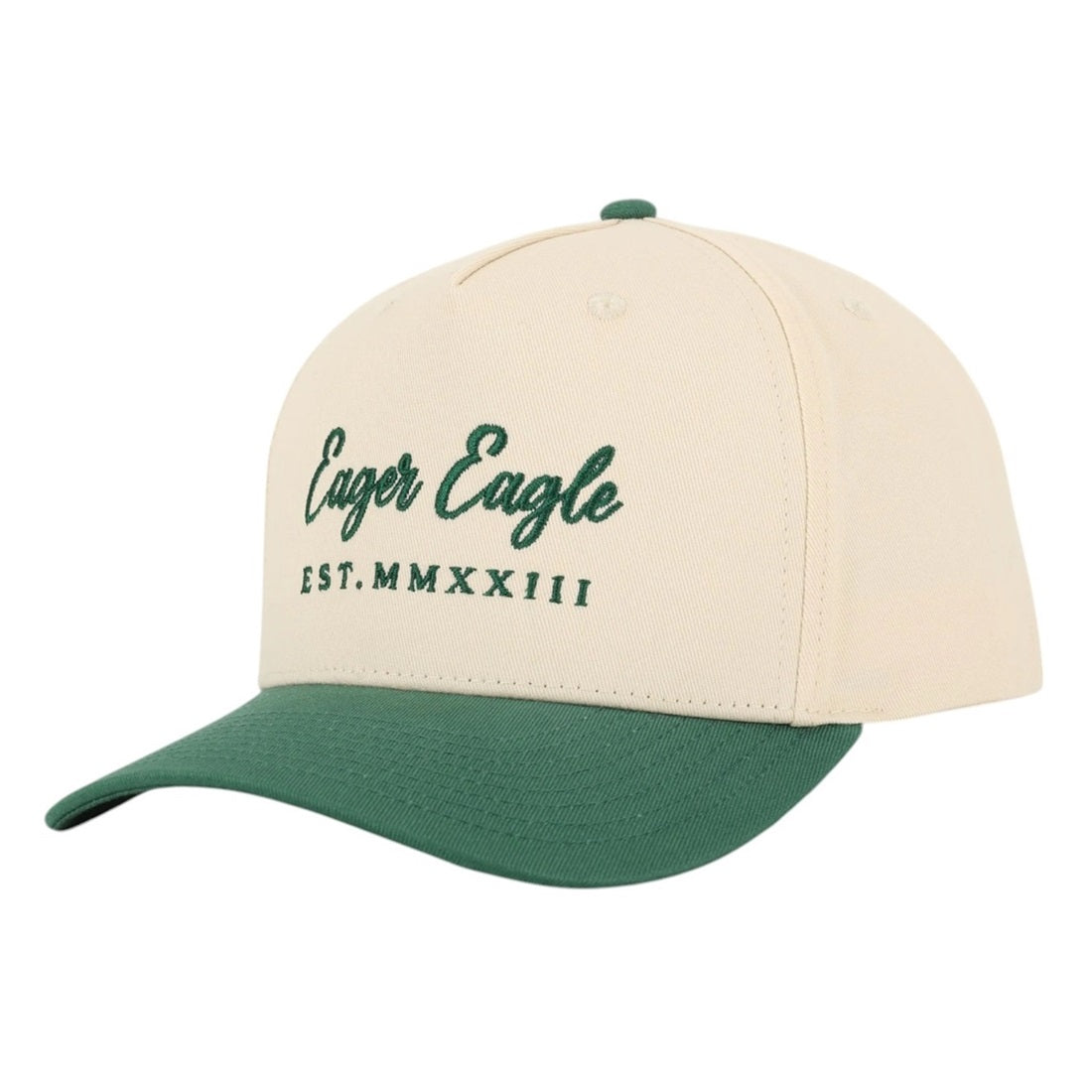 The Heritage | Golf Hat is a cream cap with a green brim and button, featuring green Eager Eagle EST. MMXXIII embroidery on the front—crafted from premium cotton for timeless golf style.