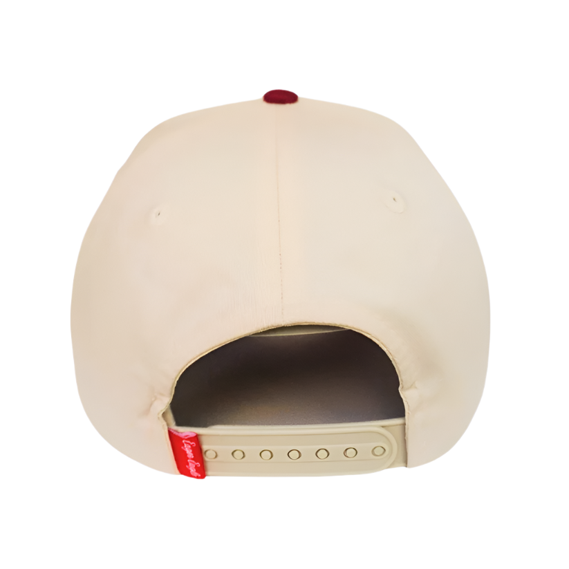 Oxblood | Golf Hat viewed from the back, featuring an adjustable strap and a small red tag with white writing on the left side. Offers UPF50+ sun protection for outdoor comfort.